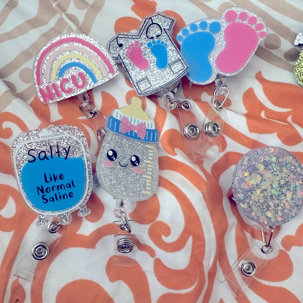 Badges, keychains & pens!